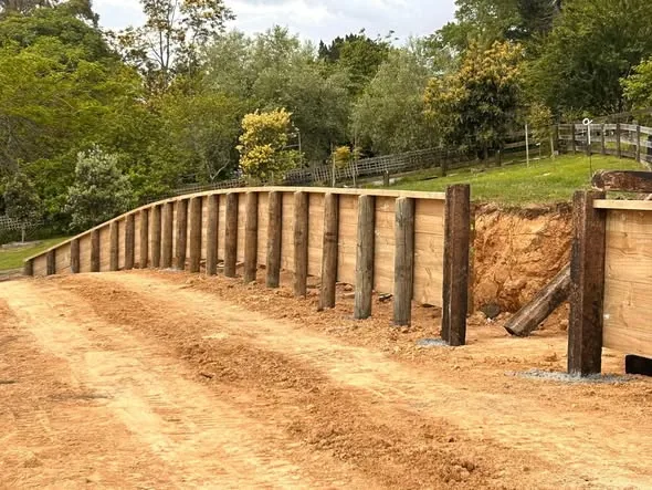 Interlocking post and rail frontage fence at Waikato Shed Company offices