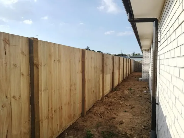 Spaced dressed-timber paling fence on a new subdivided property